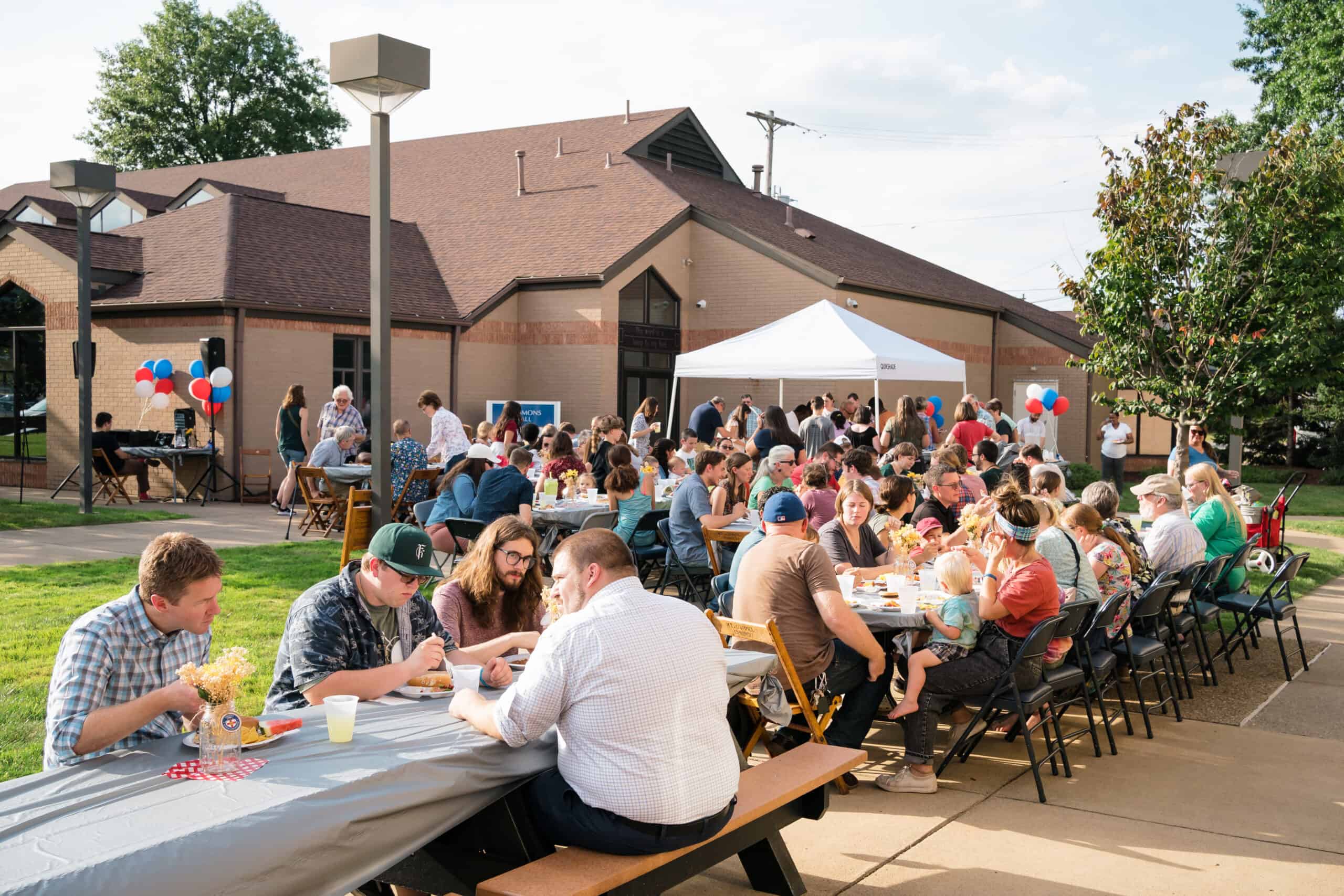 Faculty, Staff, and Students gather in the courtyard.